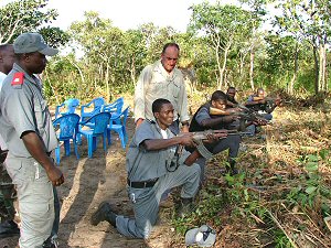 Prospective armed guards under careful supervision on the Guard Force Training course