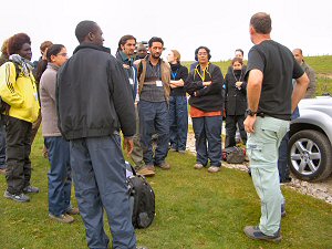A team works together on a problem-solving exercise to help develop leadership skills
